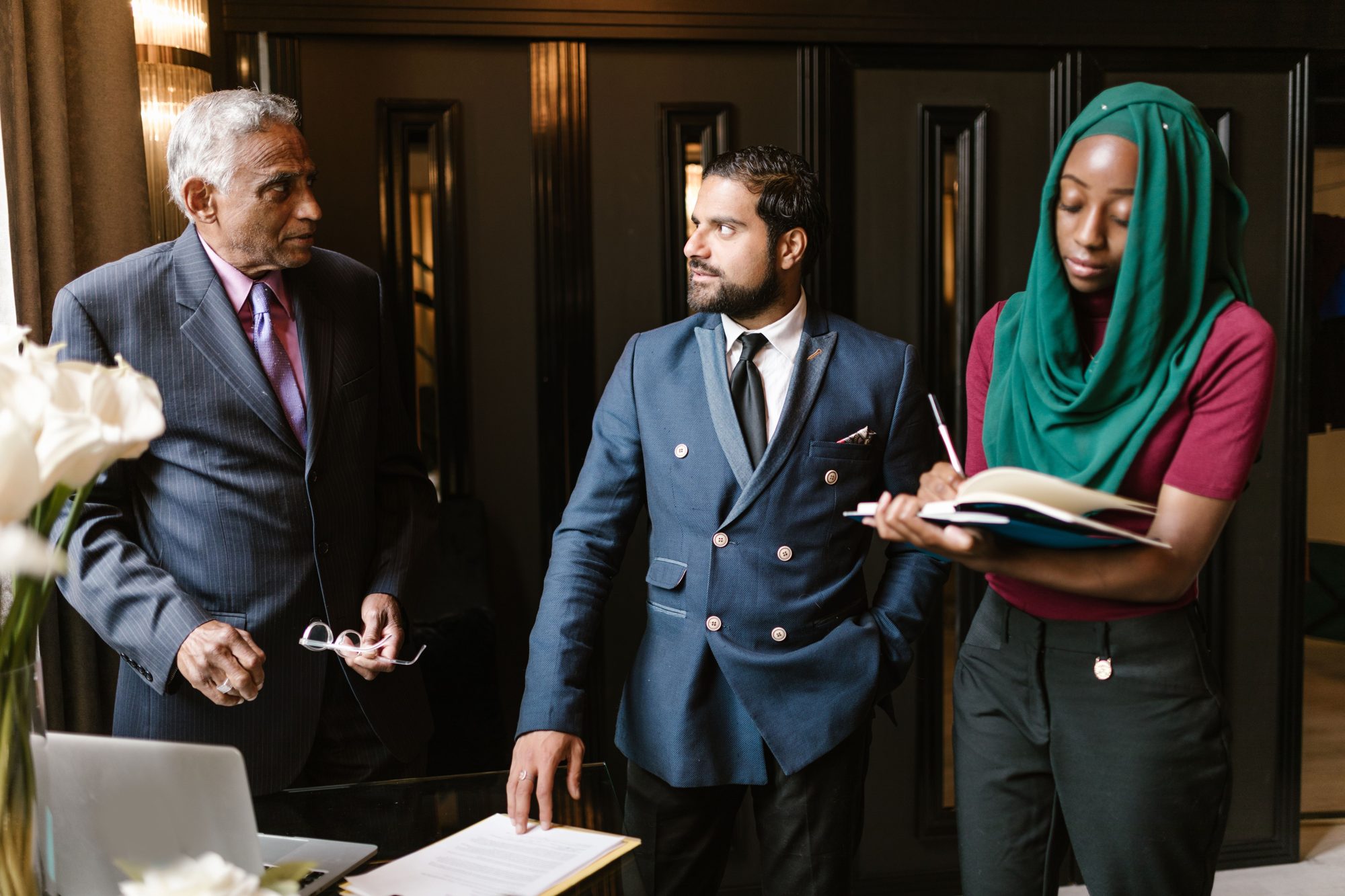Navarus team in discussion with a client